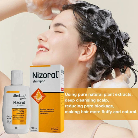 Woman washing her hair with Nizoral shampoo, product packaging displayed.